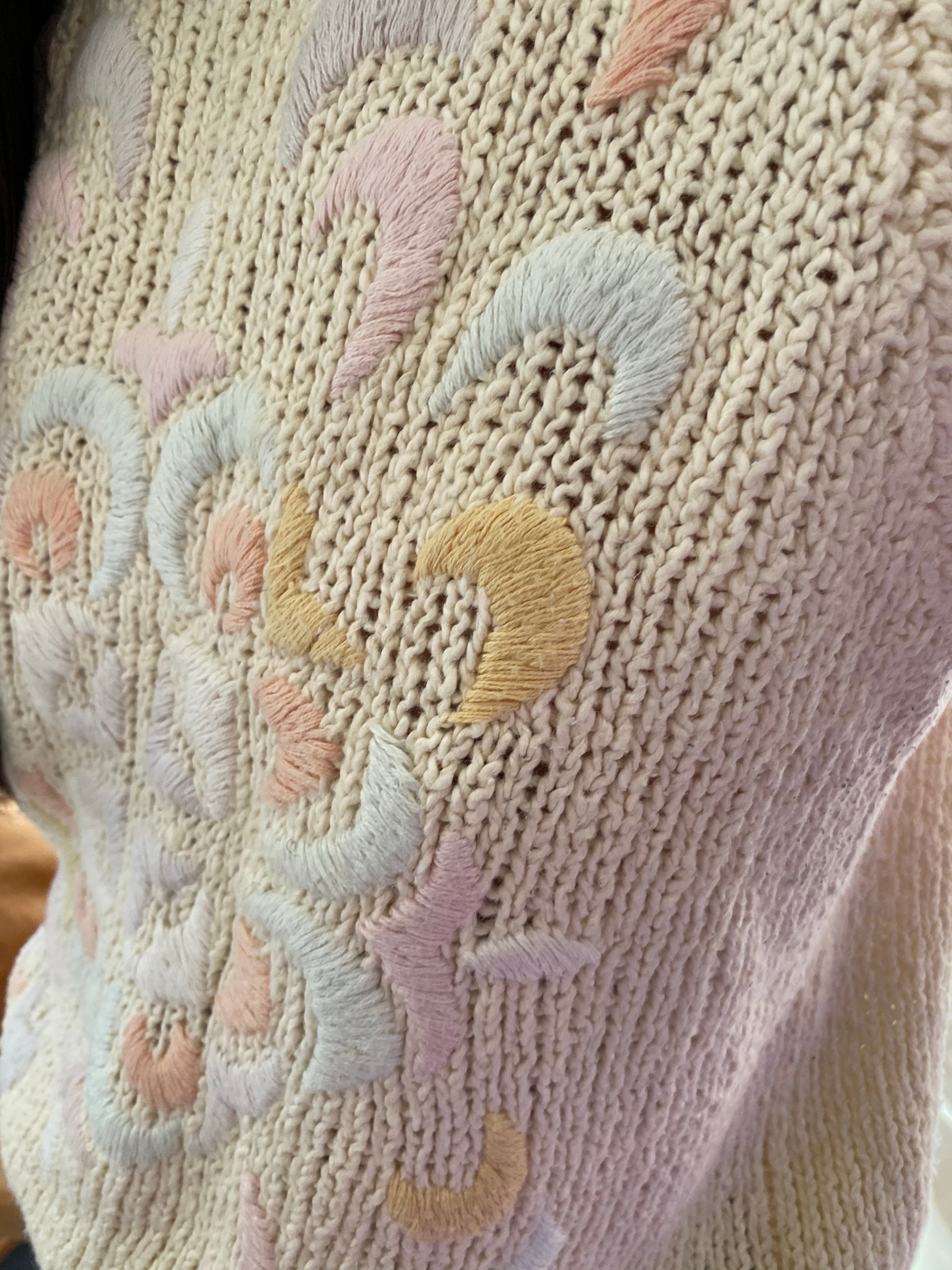 knit sleeveless cotton sweater